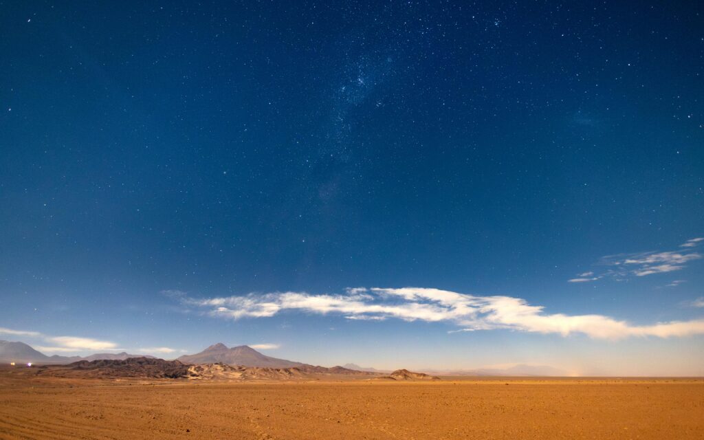 pexels-photo-27853118-27853118 Stunning starry sky above Atacama Desert highlighting vast landscape and night sky elegance.